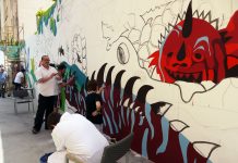 Alumnos de ESAT colaboran con Ajubel en una intervención mural